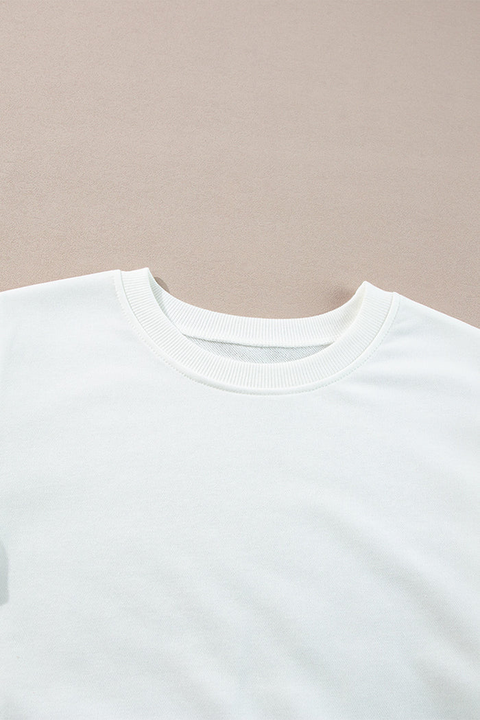 Haut blanc à manches longues en French Terry color block