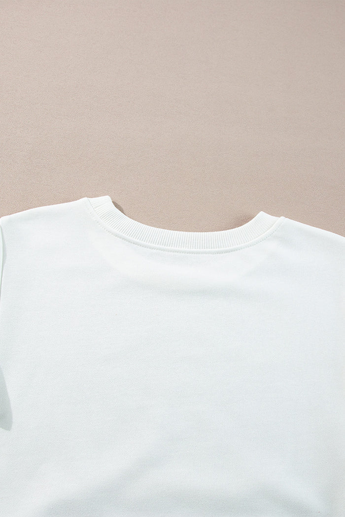 Haut blanc à manches longues en French Terry color block