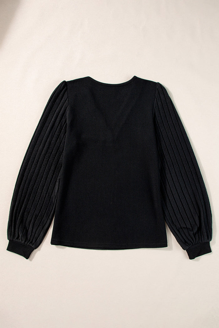 Haut côtelé noir boutonné *