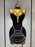 Jamilah strapless mini bodycon dress with rhinestone chain detailing and backless design for women’s birthday or evening parties.