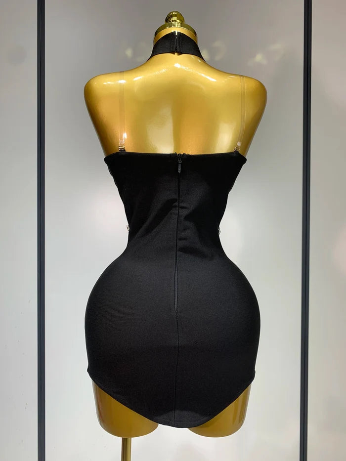 Jamilah strapless mini bodycon dress with rhinestone chain detailing and backless design for women’s birthday or evening parties.