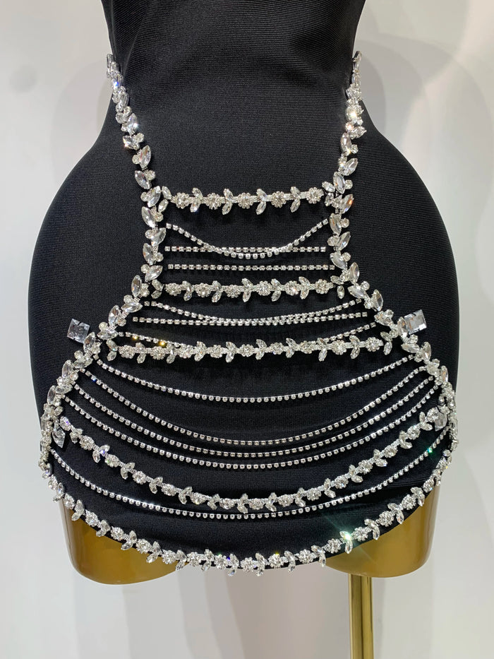 Jamilah strapless mini bodycon dress with rhinestone chain detailing and backless design for women’s birthday or evening parties.