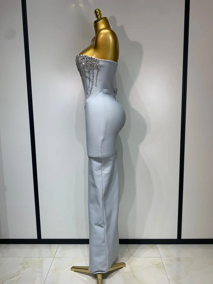 Jasmine strapless grey bandage dress with beading details and backless design for evening parties.