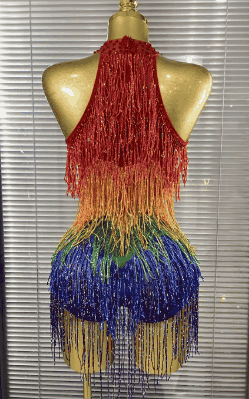 Jaye rainbow sequin tassel bodysuit for women. Sexy off shoulder outfit for birthdays, nightclub parties, and celebration events.