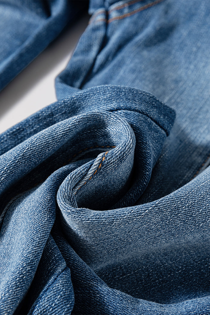 Jean évasé taille haute bleu voile avec braguette boutonnée