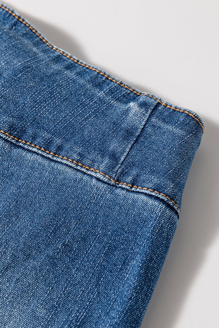 Jean évasé taille haute bleu voile avec braguette boutonnée