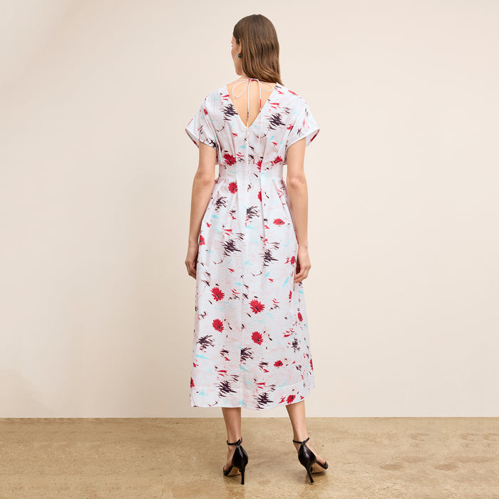 Back image of a woman wearing the Jelina Dress in Brushed Floral