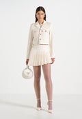 joelle-asymmetric-pleated-mini-skirt-off-white