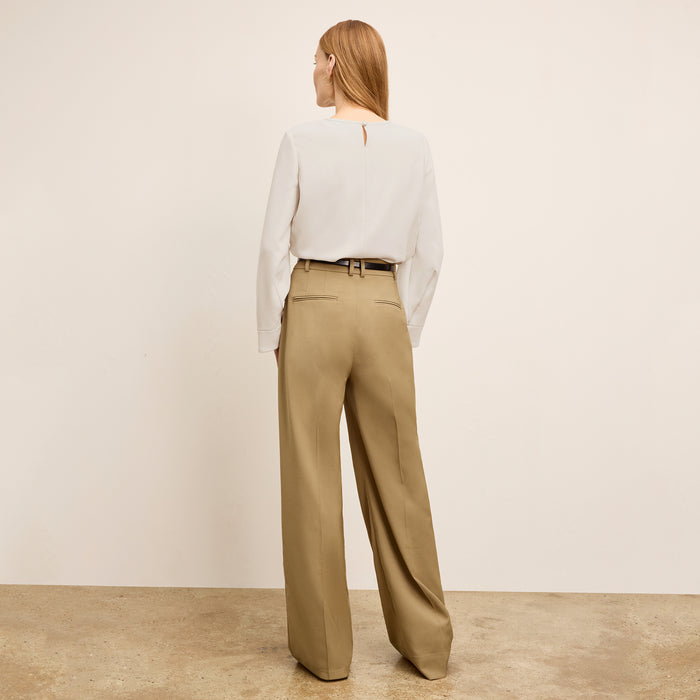 back image of a woman wearing the jules top in eggshell