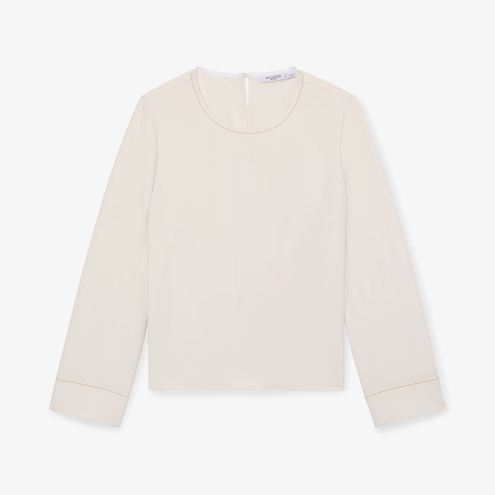 packshot image of the jules top in eggshell