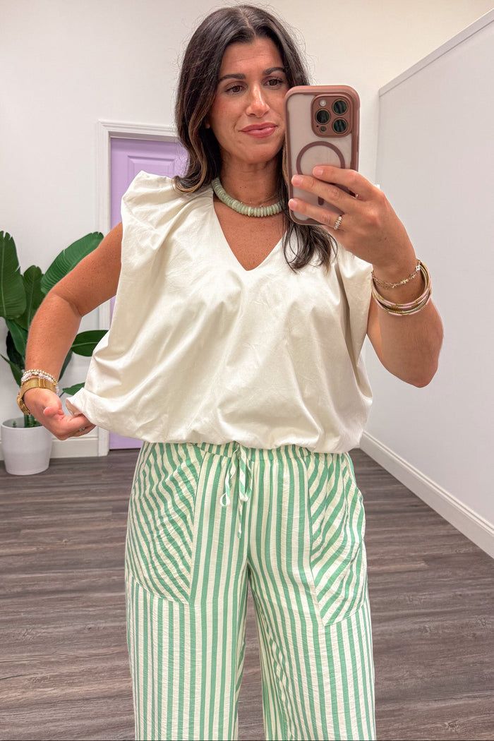 solid khaki flutter sleeve bubble hem v neckline semi-cropped poplin top