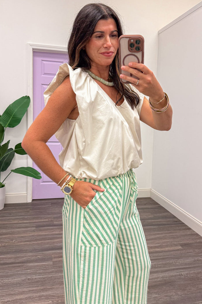 solid khaki flutter sleeve bubble hem v neckline semi-cropped cotton poplin top