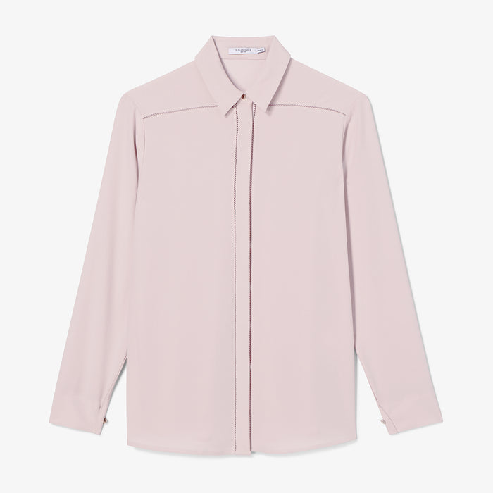 Light pink shirt on a white background