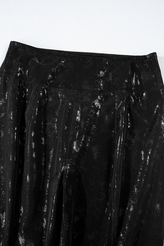 Legging taille haute fendu en simili cuir noir