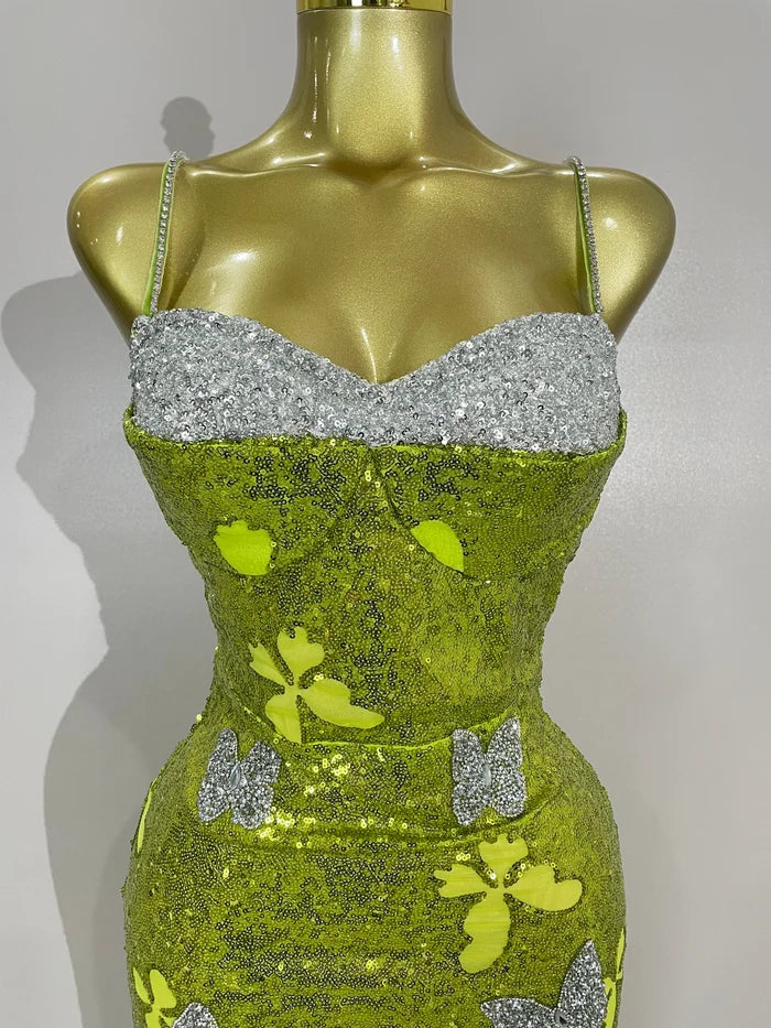 Liora butterfly crystal sexy halter green bodycon long dress with crystal details and slim-fit design.