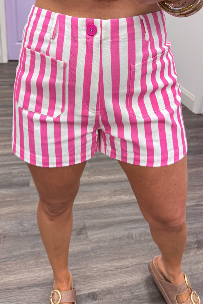 pink and white vertical striped denim twill shorts with zip-fly button closure