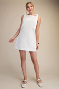 women's white mini dress with bow detailing at shoulders