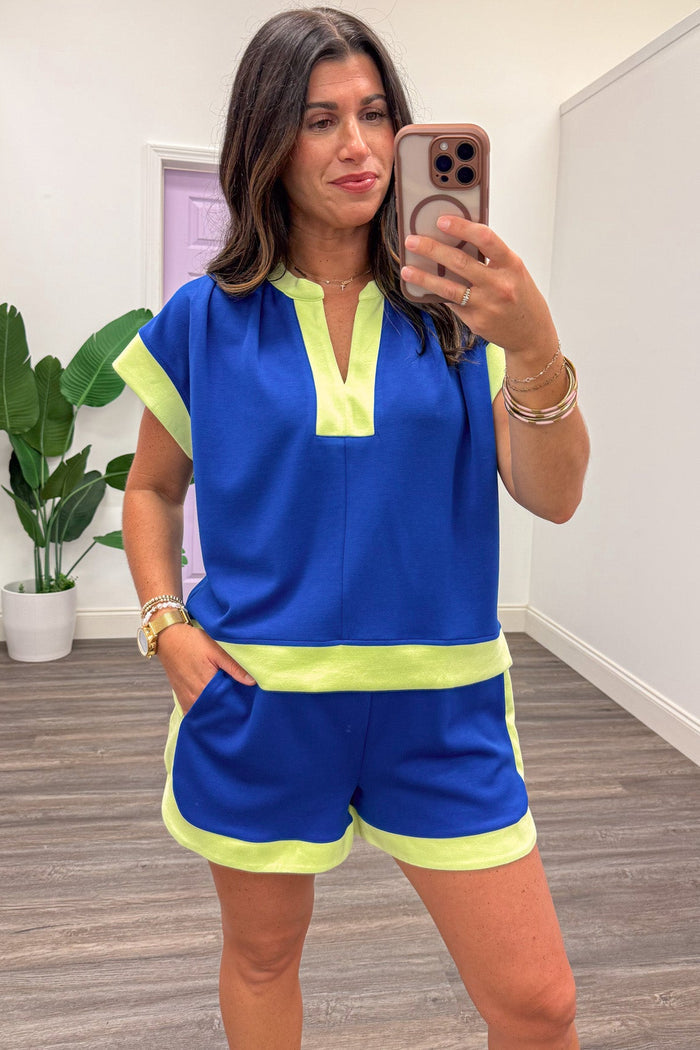 royal blue with lime colorblock trim capped sleeve v neckline knit top