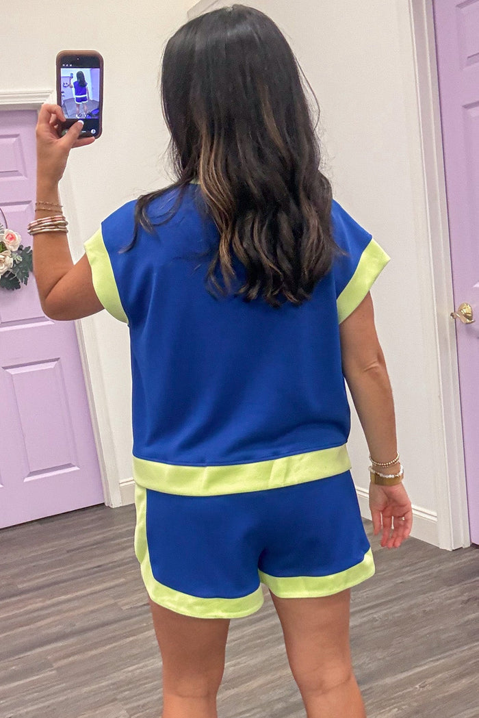 royal blue with lime colorblock trim capped sleeve v neckline soft knit top