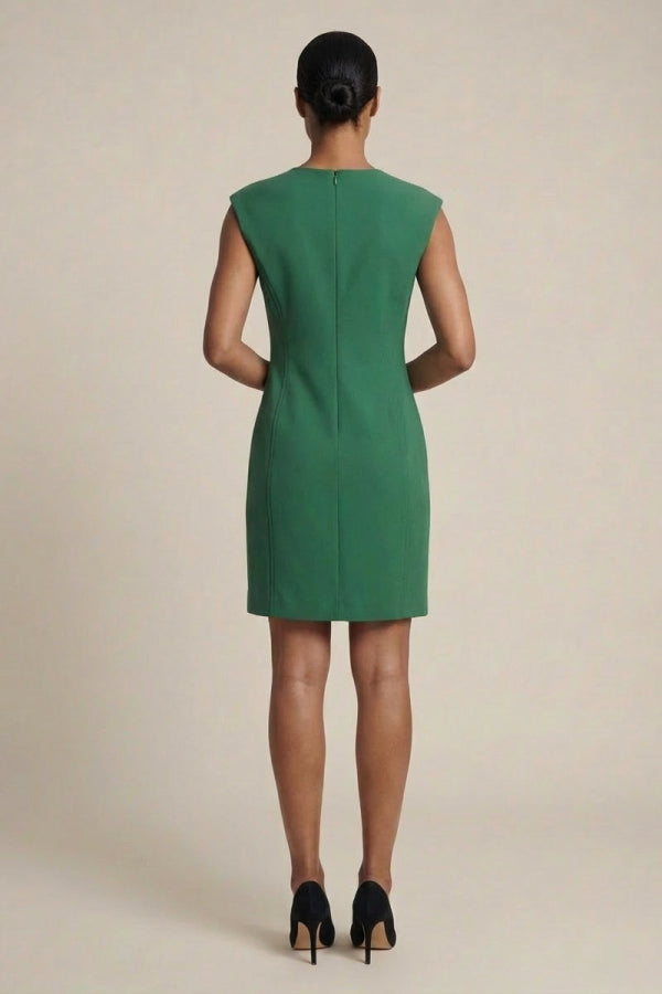 Green dress worn by a model on a beige background | Grid Hover | Exclude