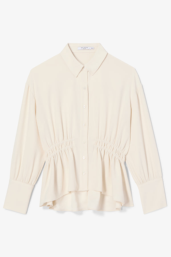 Beige blouse with ruffled details on a white background | Exclude | Still