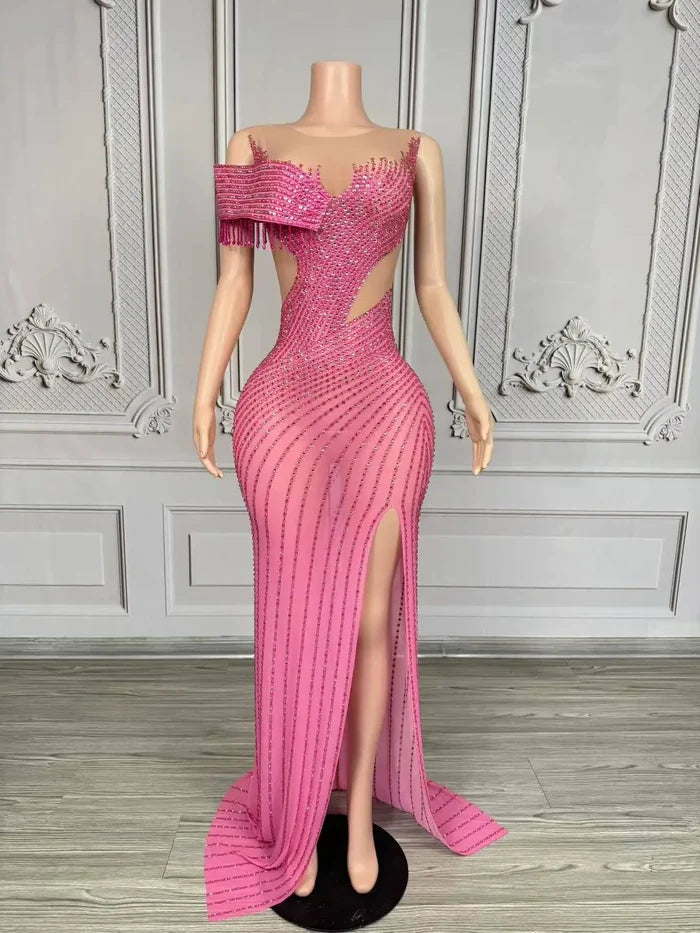 Elegant formal prom dress with sparkling rhinestones and a tasteful high split. Maya luxury evening gown.