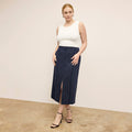 Front image of a woman wearing Meghan1.0Skirt_StripedPortoWeave_Navy-Ivory | Lead