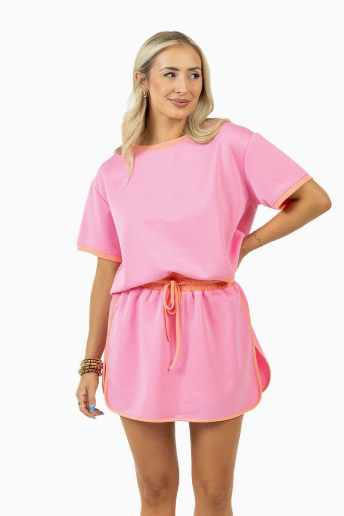 pink and orange matching skort set