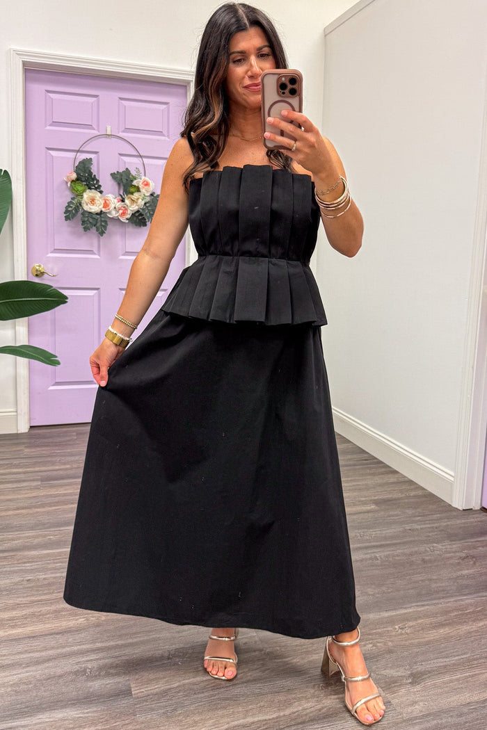solid black pleated bodice peplum waist strapless flowy midi dress