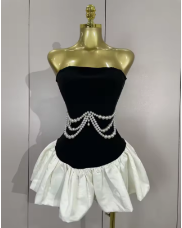 Milan wearing a strapless beading patchwork mini bandage dress for prom night.