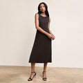 Front image of a woman wearing The Milano Dress - Ribbed Pima Modal :: Black | Lead