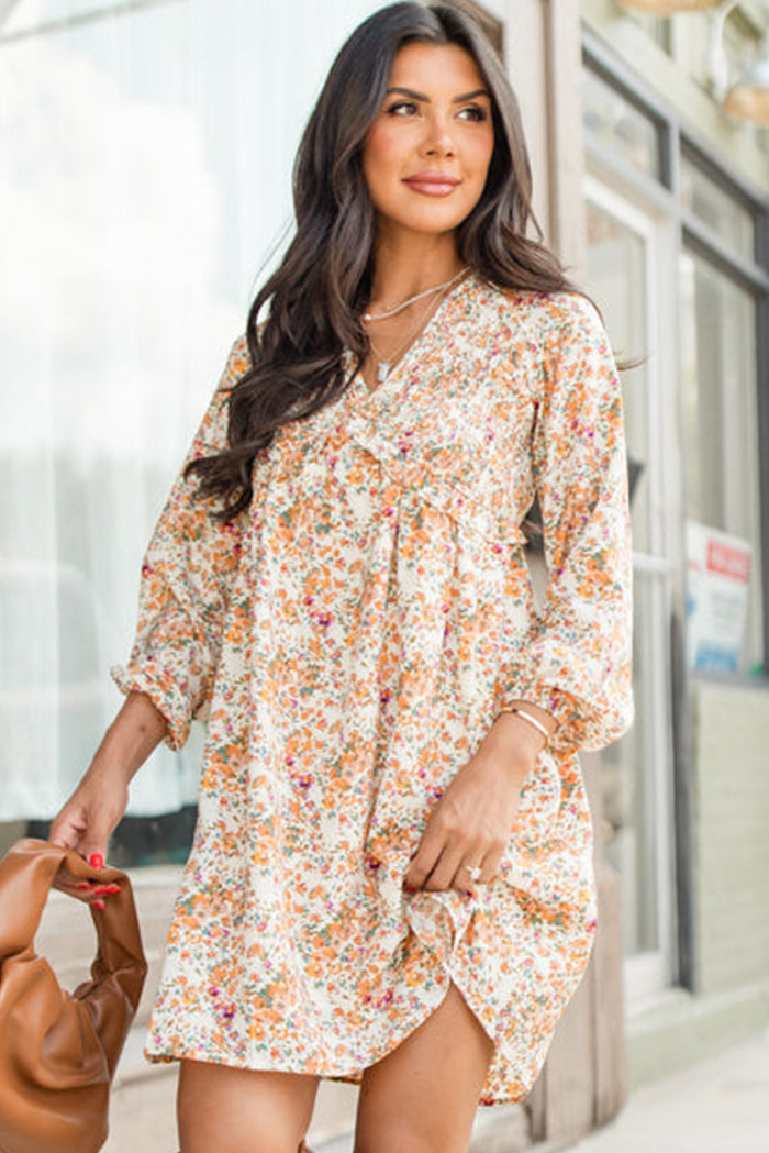 Mini-robe bohème florale à col en V et volants taille empire à manches longues jaune