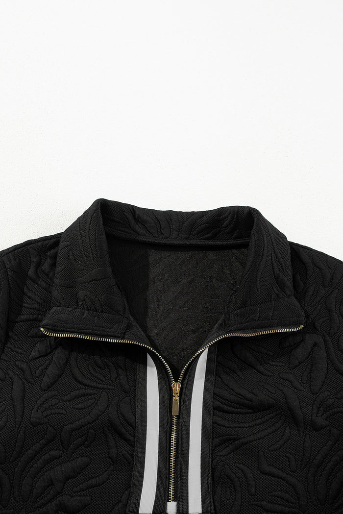 Mini-robe droite noire texturée en jacquard avec fermeture éclair sur un quart