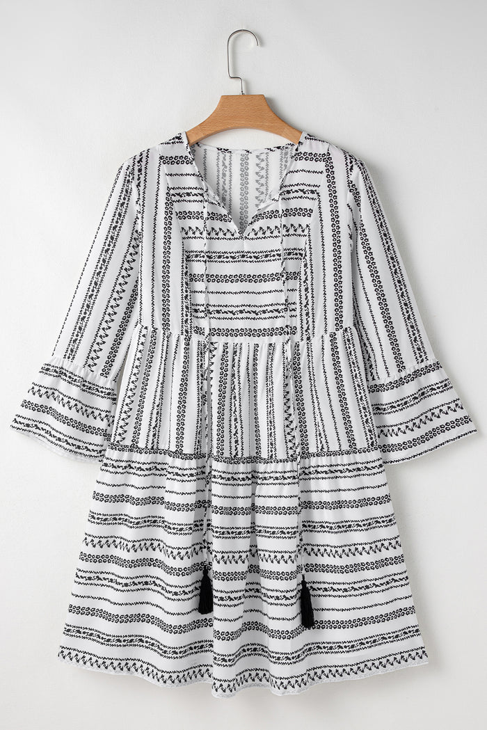 Mini-robe noire à rayures, col en V *