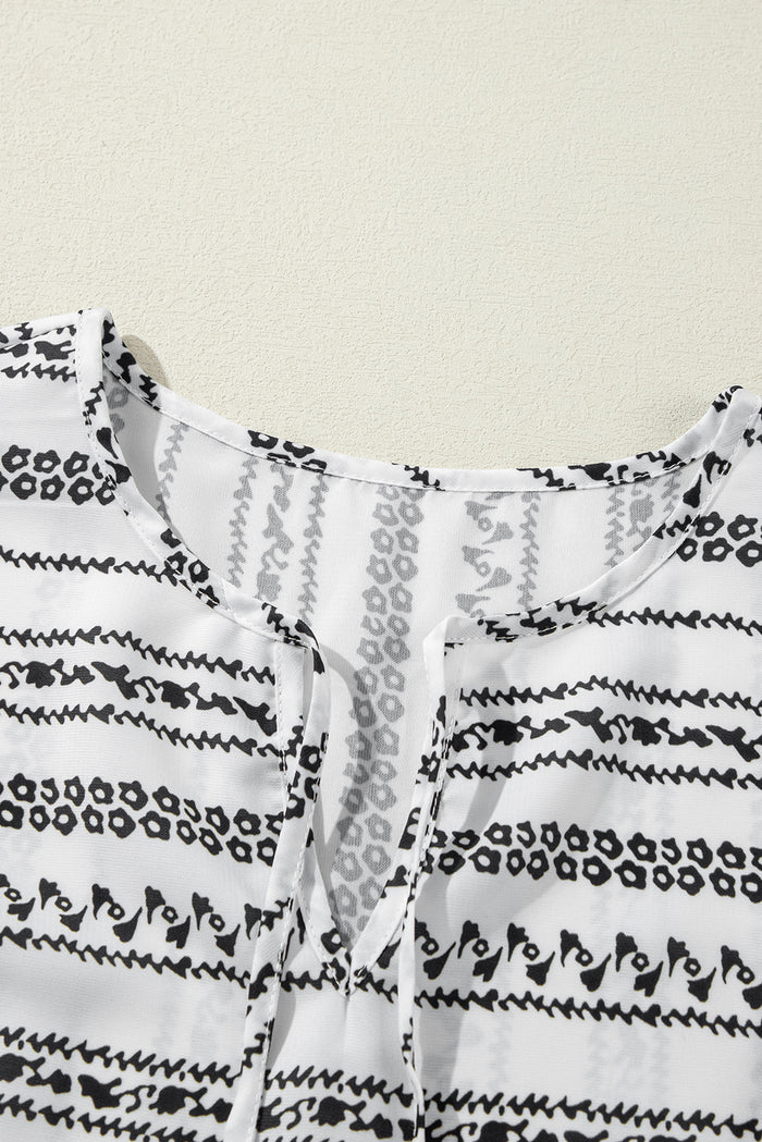 Mini-robe noire à rayures, col en V *