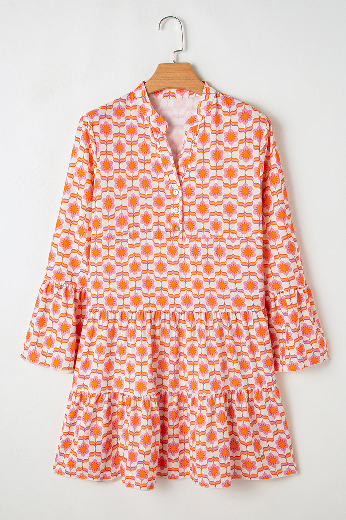 Mini-robe orange à imprimé floral et manches à volants *