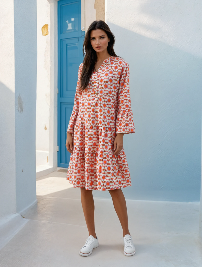 Mini-robe orange à imprimé floral et manches à volants *