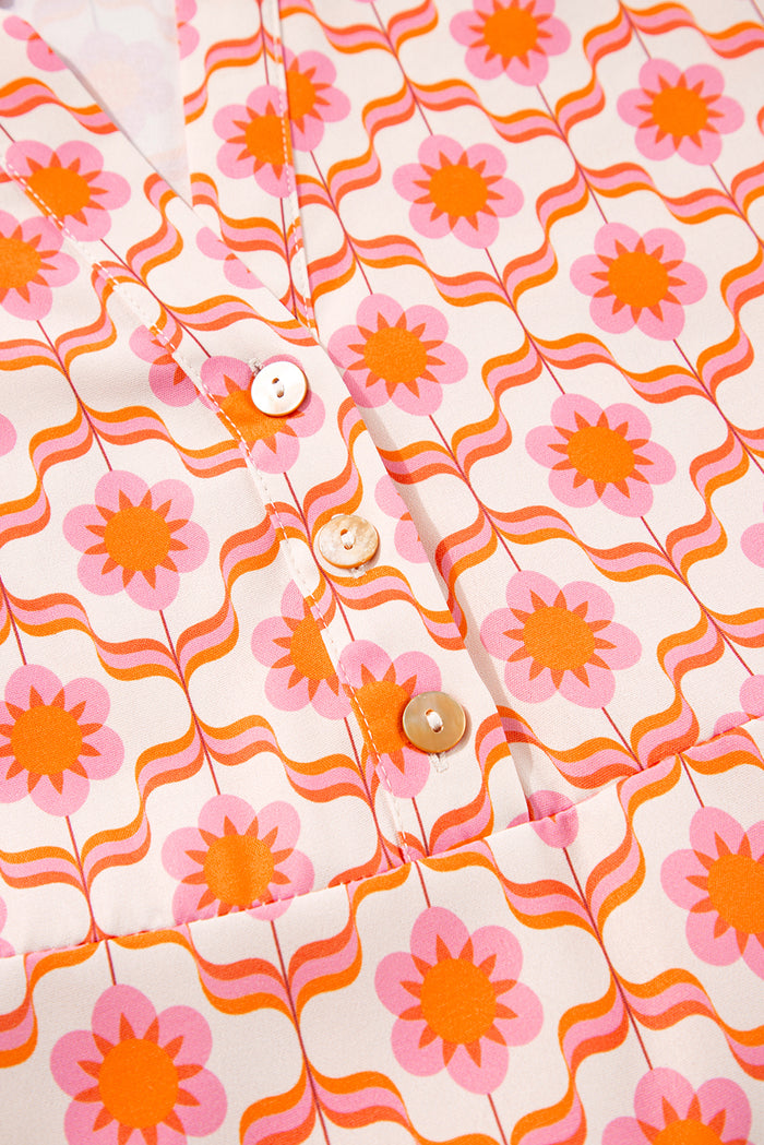 Mini-robe orange à imprimé floral et manches à volants *