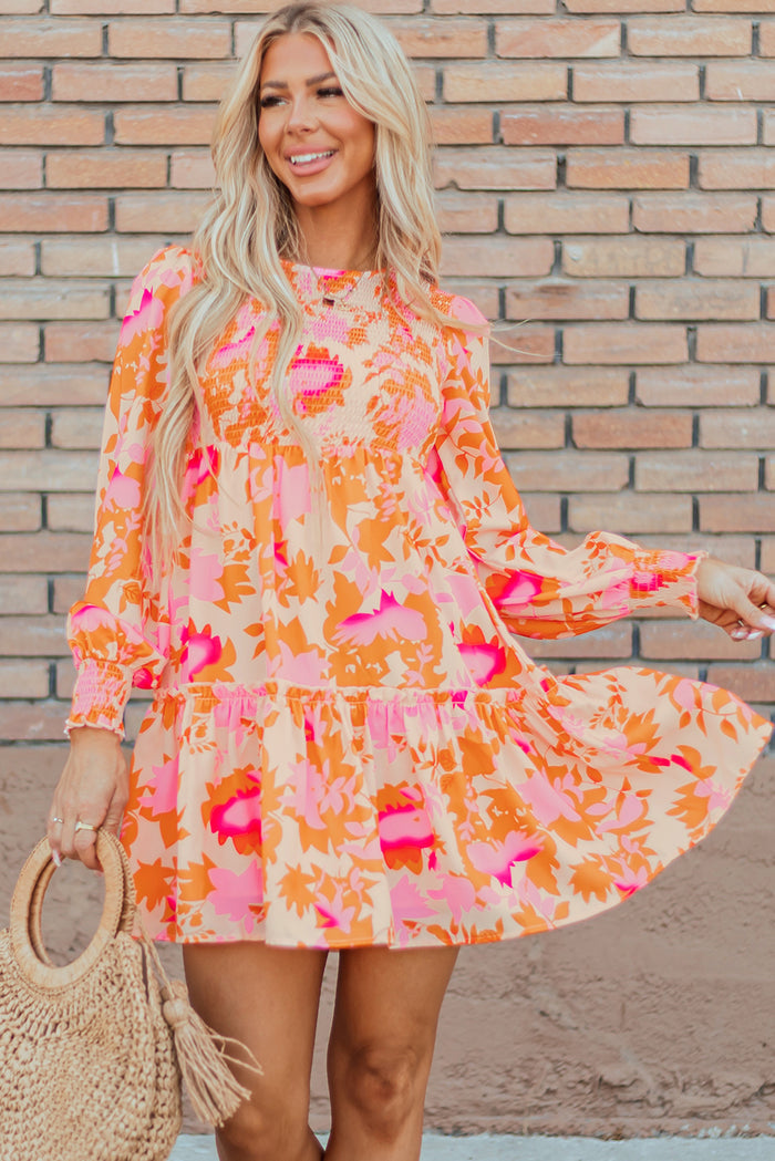 Mini-robe orange à volants et manches lanternes *