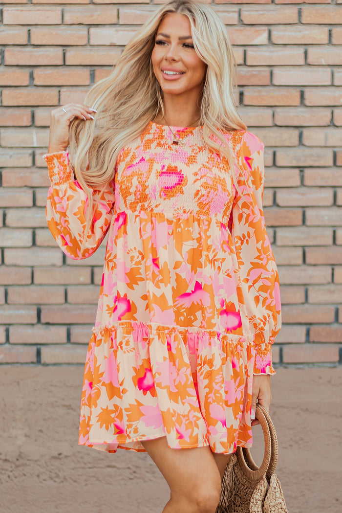 Mini-robe orange à volants et manches lanternes *