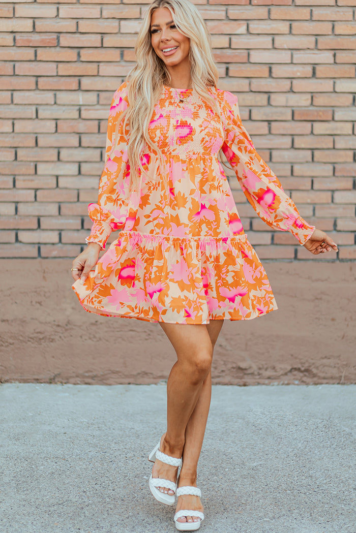 Mini-robe orange à volants et manches lanternes *