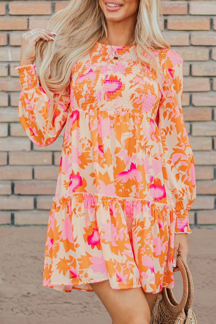 Mini-robe orange à volants et manches lanternes *