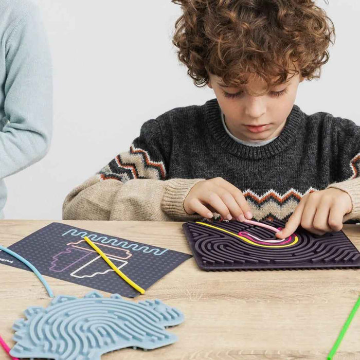 Miniland® Senzorična igrača za razvoj fine motorike Flexhetti Dino Miniland