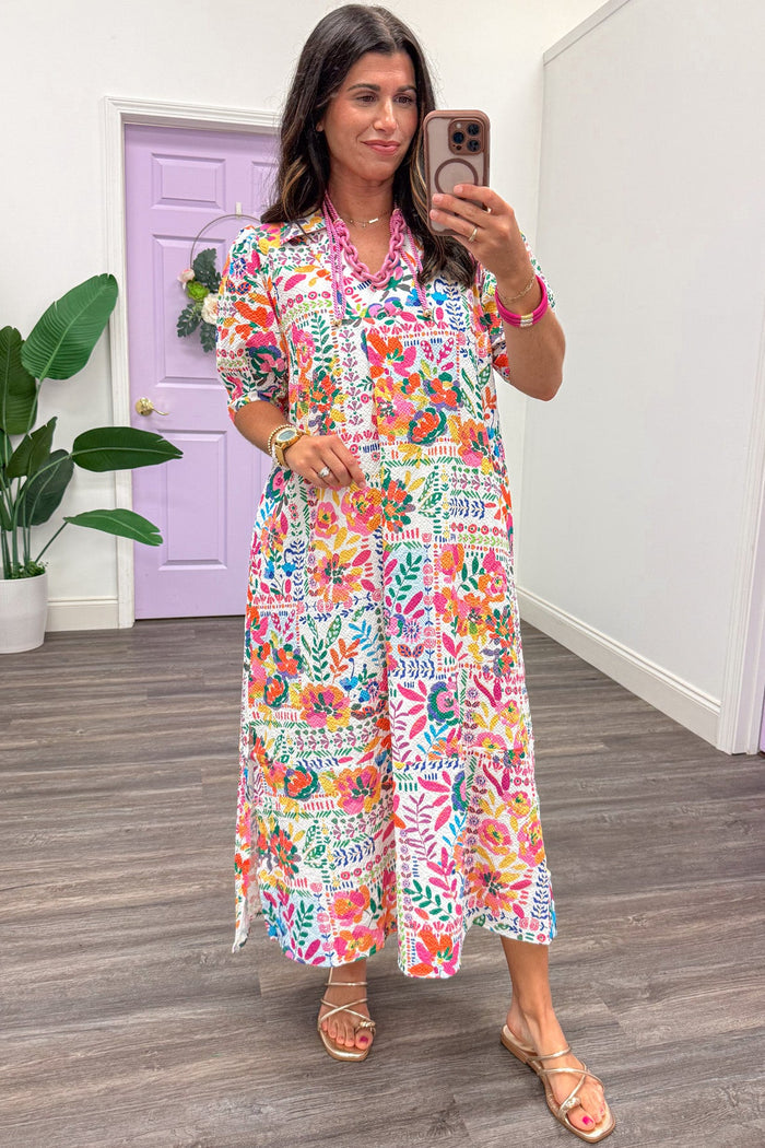 bright multi-colored folk art style floral print elastic short sleeve v neckline midi dress