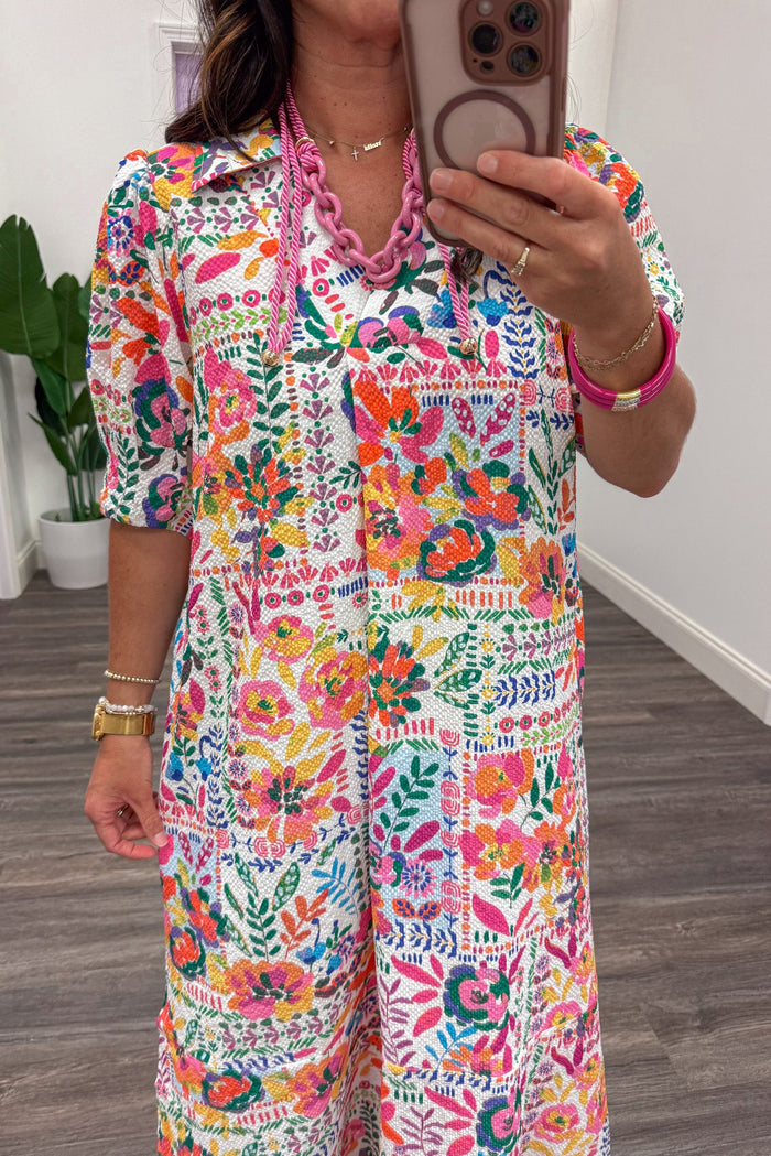 bright multi-colored folk art style floral print short sleeve collared v neckline midi dress
