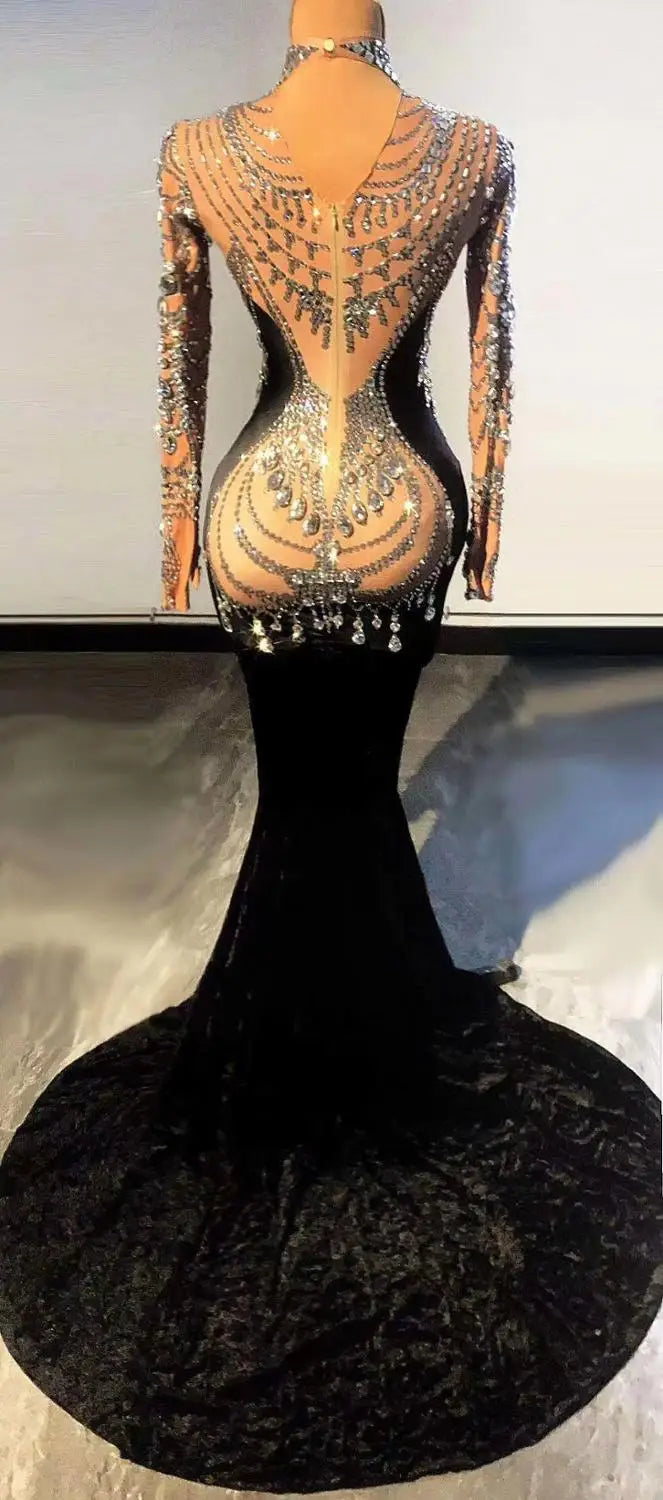 Sexy long formal prom dress made from sparkly velvet fabric. Nina luxury evening gown.