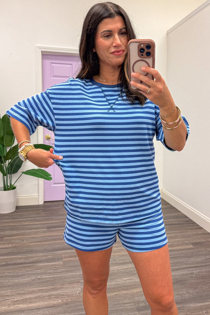 light blue and royal blue striped relaxed silhouette top and shorts matching athleisure set