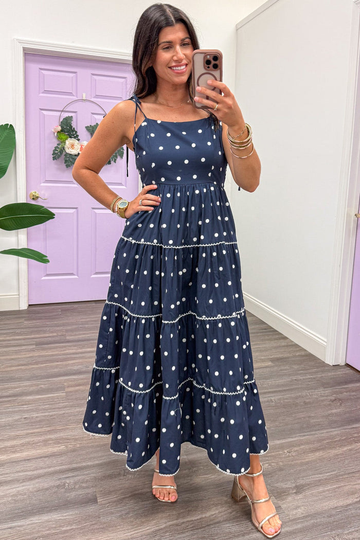 navy with white polka dot print sleeveless tiered midi dress