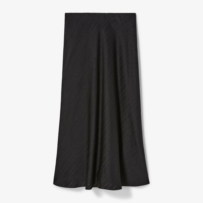 Black skirt with a subtle pattern on a white background