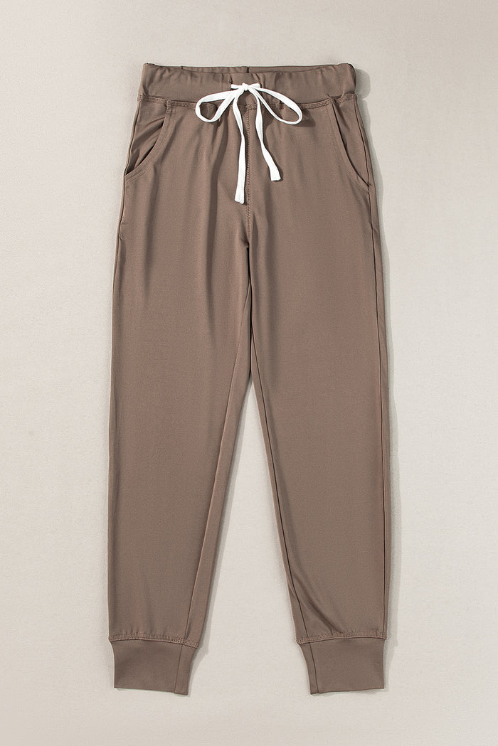 Pantalon de jogging marron foncé avec poches et cordon de serrage à la taille